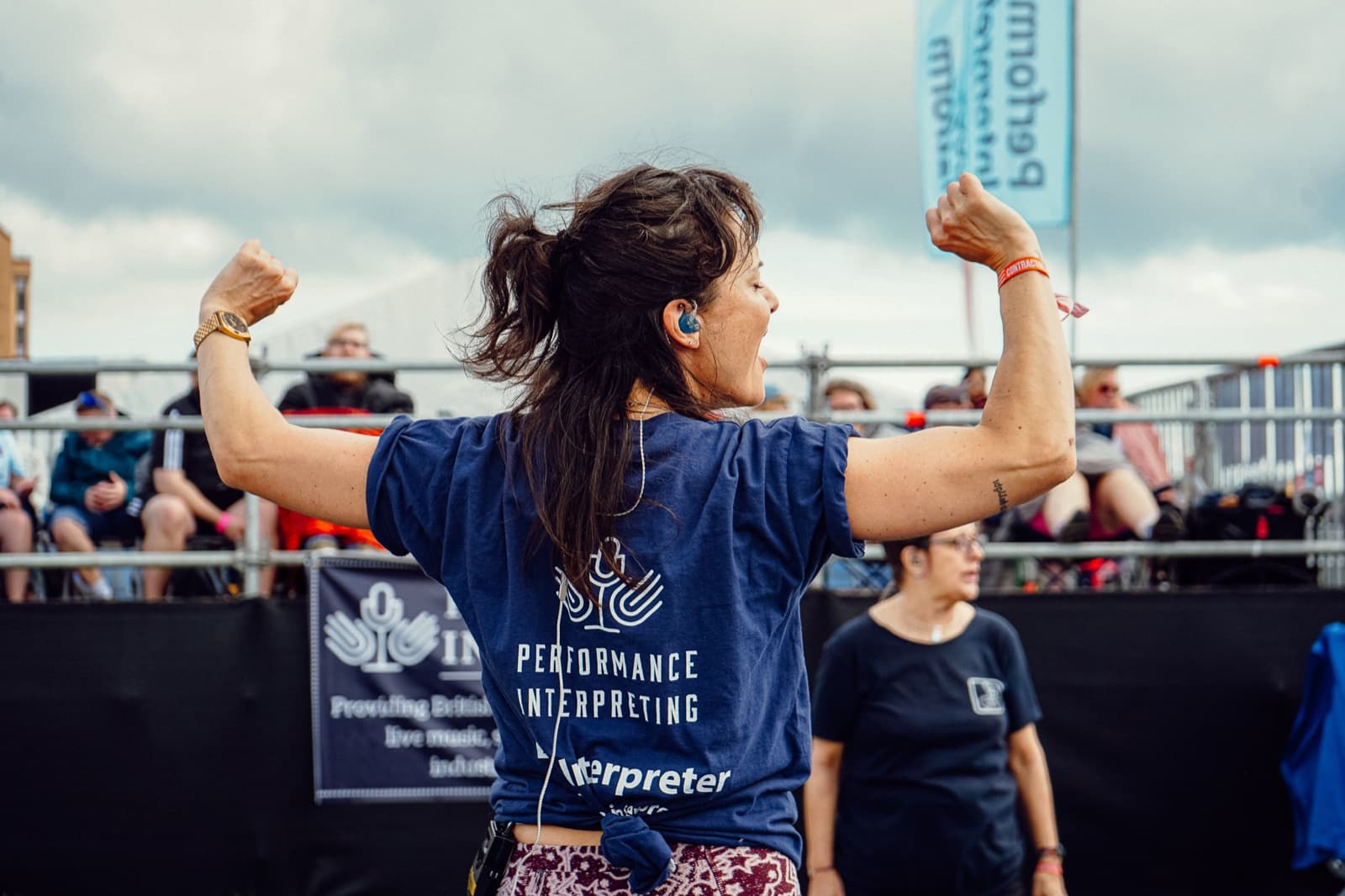 Performance interpreters at a live festival